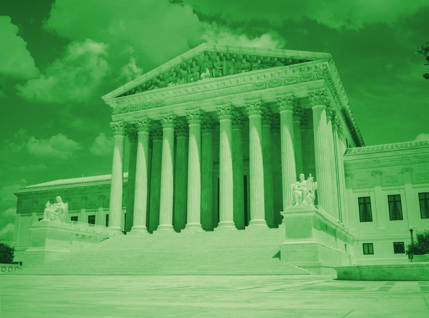 A large white neoclassical building with tall columns, evoking civic and judicial institutions.